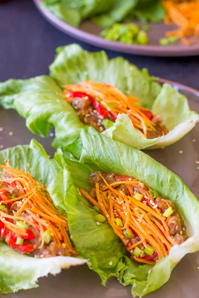 Vegan Asian Lettuce Wraps with Sweet Sriracha Sauce are healthy, delicious and made with an incredible unique filling!! #vegetarian #vegan #healthy